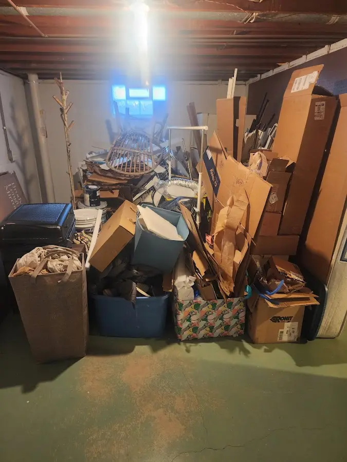 Roll-off dumpster container at job site for 15 Yard Dumpster Rental in Spring Arbor